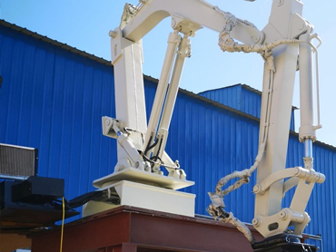 Penggunaan manipulator casting di hadapan oven